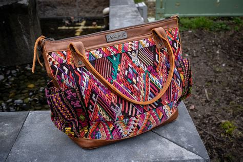 Nena and co - Artisan bags handmade by women in the Maya highlands of Guatemala. Each bag is one-of-a-kind, hand woven and loomed to give it beautiful uniqueness. 
